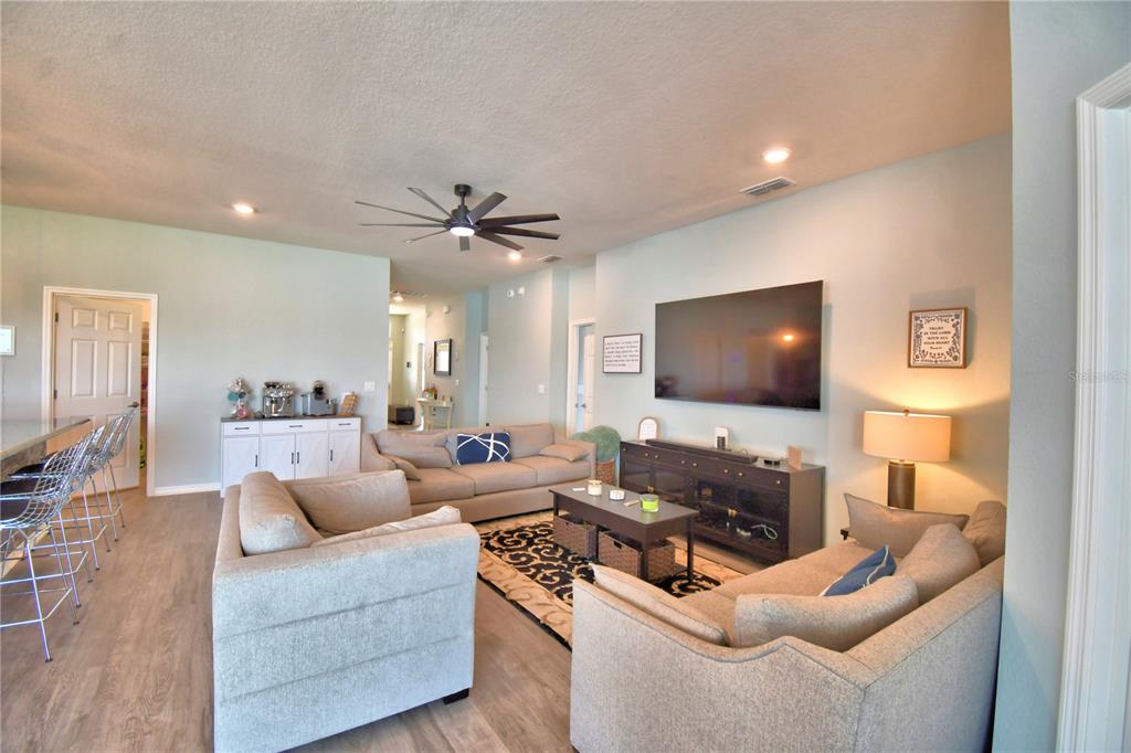 4340 Reding Way Lakeland, FL 33813 - Photo 17 of 63 a living room with furniture and a flat screen tv