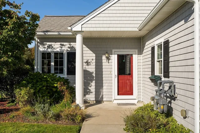 a front view of a house with a porch