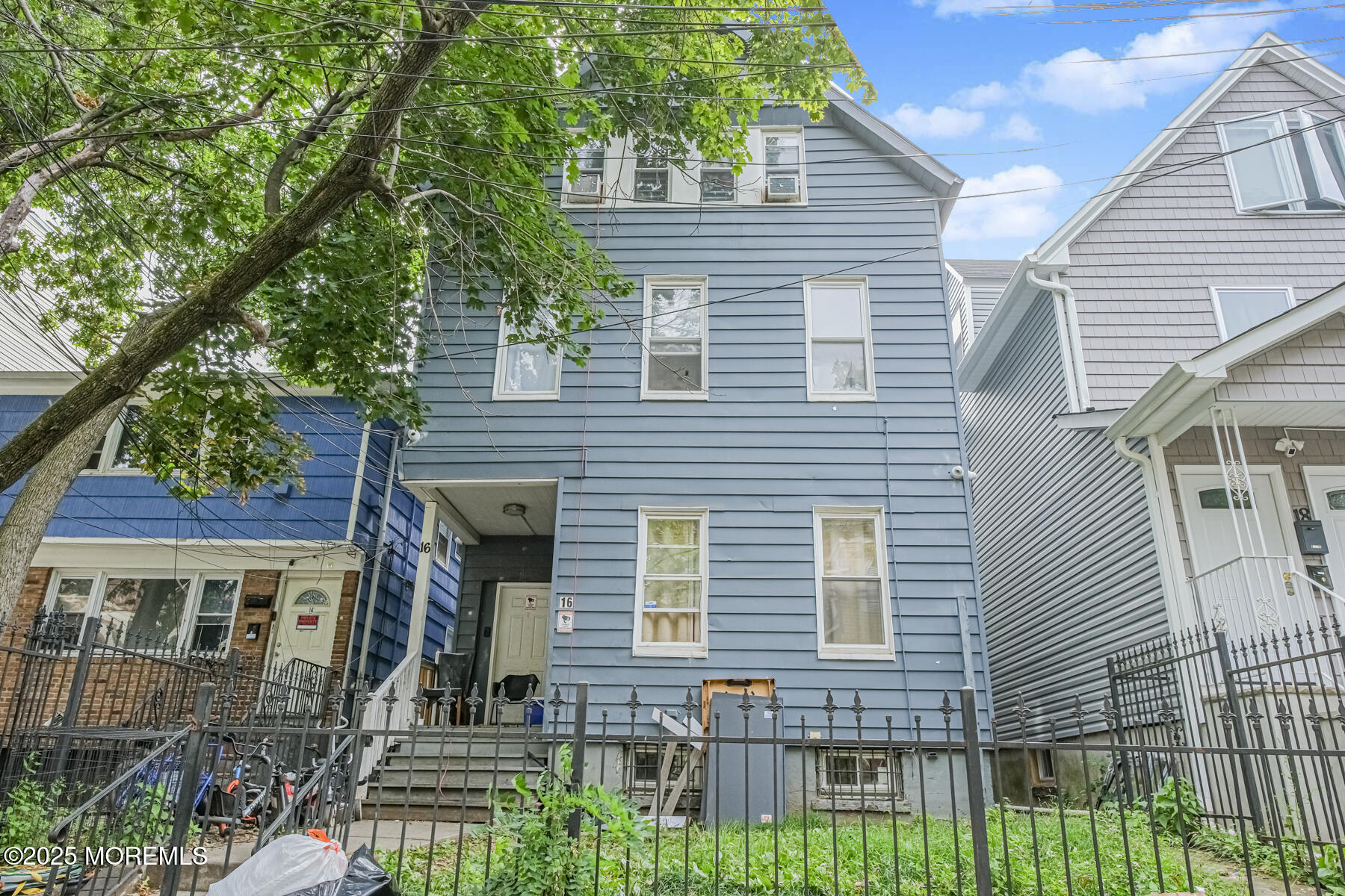 16 Alexander Street Newark, NJ 07106 - Photo 1 of 26 a view of a house with a balcony