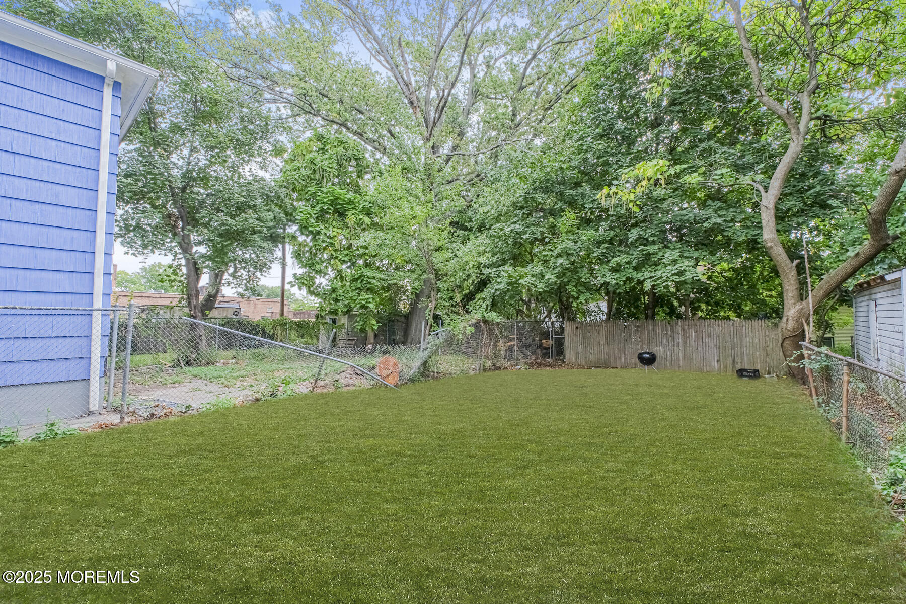 16 Alexander Street Newark, NJ 07106 - Photo 25 of 26 a view of a backyard of the house