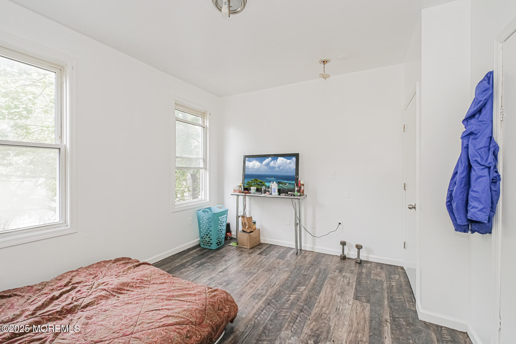 16 Alexander Street Newark, NJ 07106 - Photo 7 of 26 a bedroom with a bed and a window