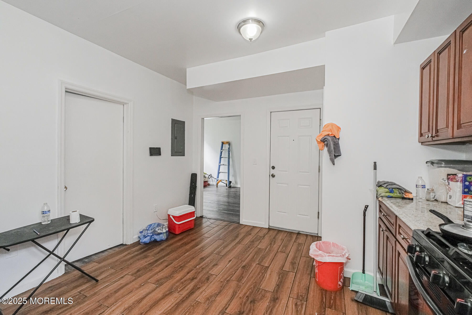 16 Alexander Street Newark, NJ 07106 - Photo 8 of 26 a view of a room with wooden floor and furniture