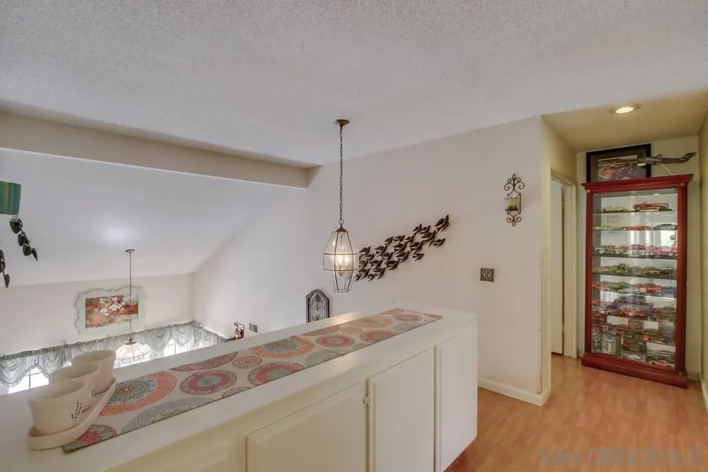 13590 Freeport Road San Diego, CA 92129 - Photo 34 of 58 a bathroom with a sink and a mirror