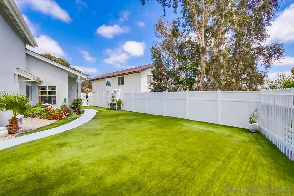 13590 Freeport Road San Diego, CA 92129 - Photo 56 of 58 a view of a backyard with plants and a patio