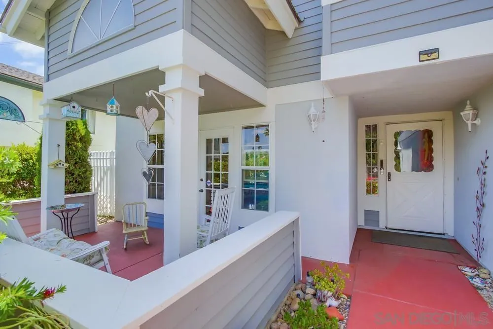 13590 Freeport Road San Diego, CA 92129 - Photo 7 of 58 a view of an entryway with wooden floor and windows
