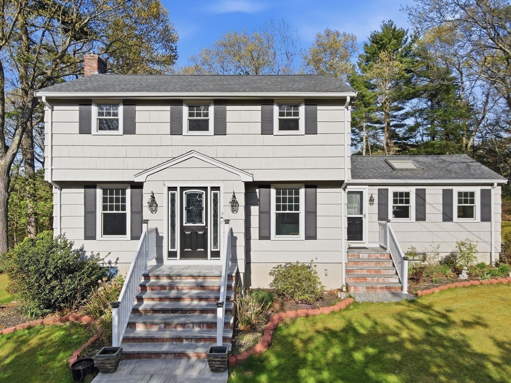 3 Fairway Drive Canton, MA 02021 - Photo 3 of 34 front view of a house with a yard