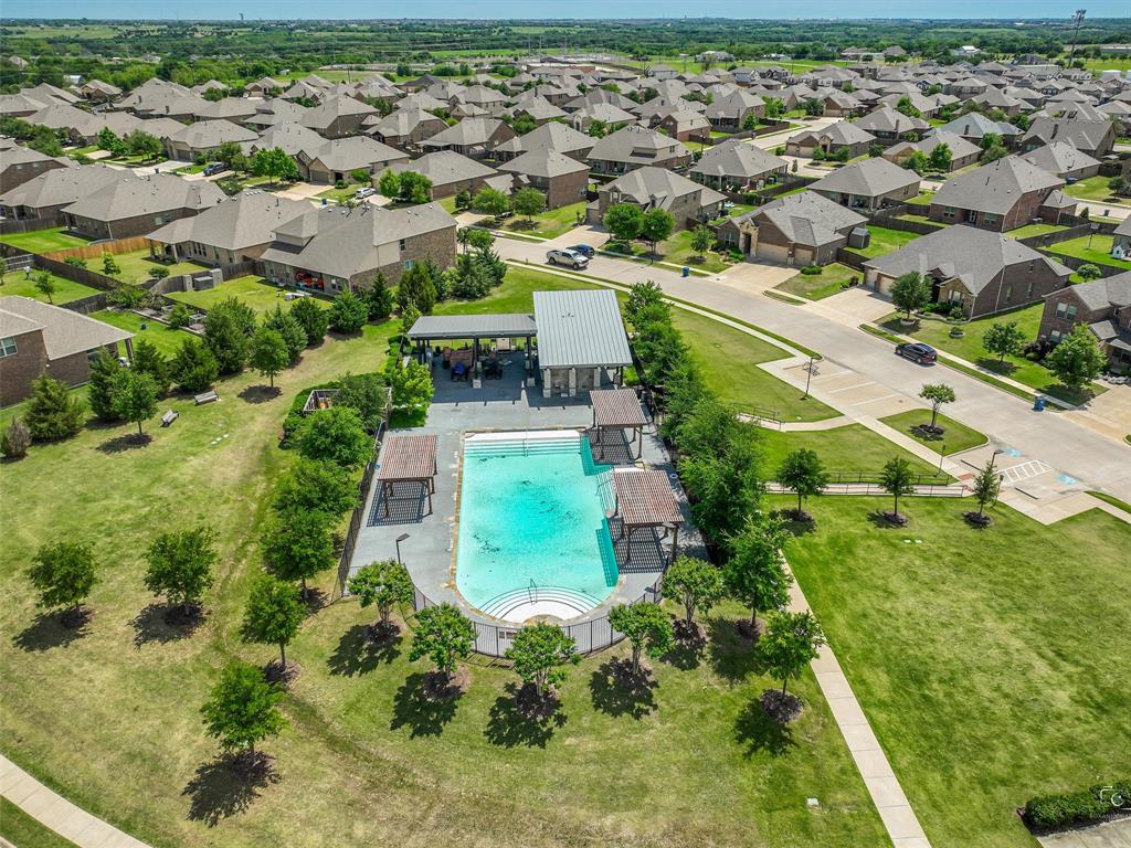 3106 Maverick Drive Forney, TX 75126 - Photo 23 of 32 an aerial view of residential houses with outdoor space