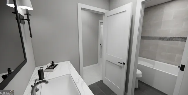 a bathroom with a tub and shower