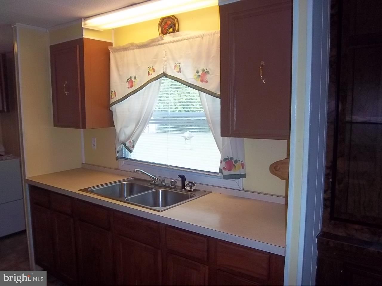 7011 Beulah Road Hurlock, MD 21643 - Photo 8 of 19 Kitchen overlooking the back yard