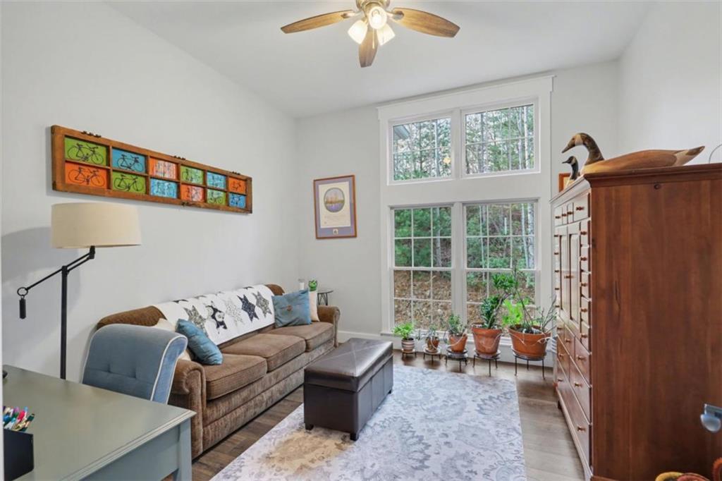452 Chestnut Mountain Road Blairsville, GA 30512 - Photo 14 of 77 a living room with furniture and a window
