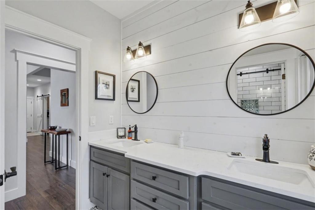 452 Chestnut Mountain Road Blairsville, GA 30512 - Photo 19 of 77 a bathroom with a sink and a mirror