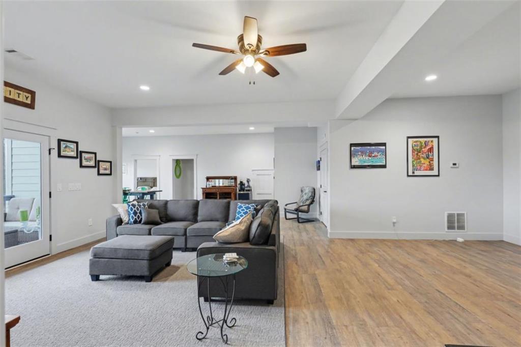 452 Chestnut Mountain Road Blairsville, GA 30512 - Photo 59 of 77 a living room with furniture and a wooden floor