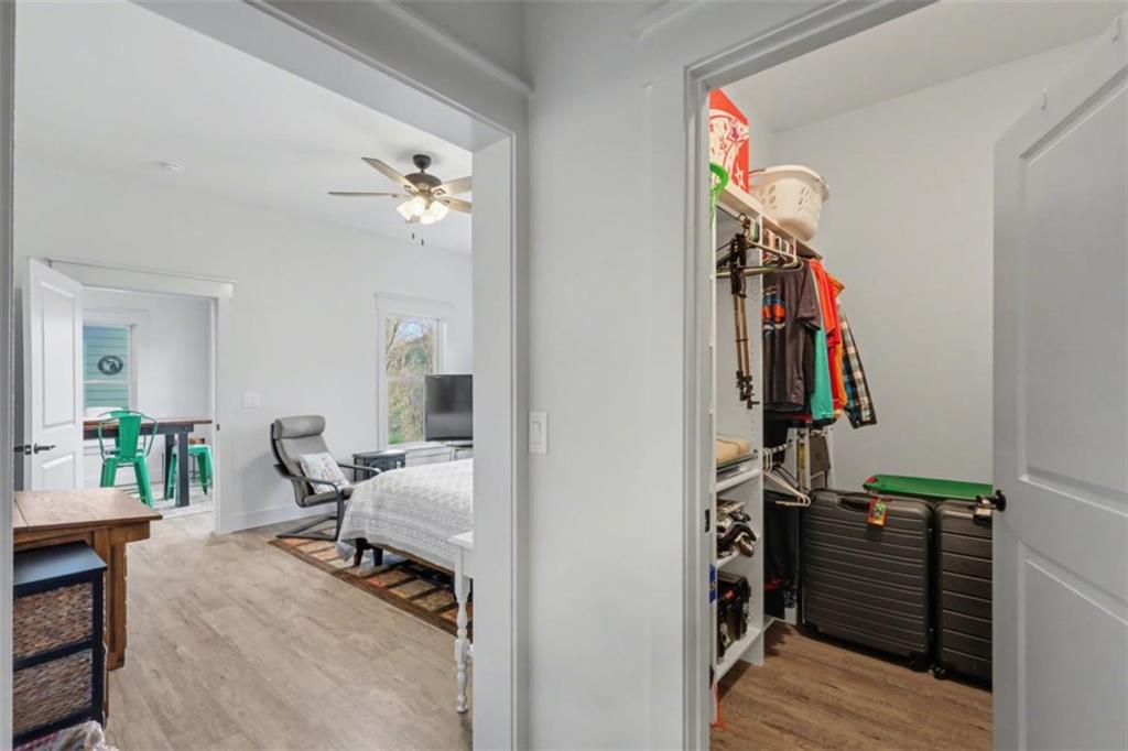 452 Chestnut Mountain Road Blairsville, GA 30512 - Photo 68 of 77 a view of walk in closet with clothes and shoes
