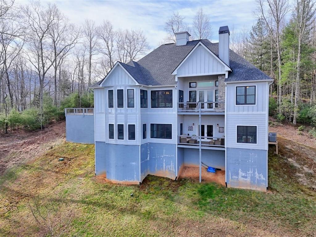 452 Chestnut Mountain Road Blairsville, GA 30512 - Photo 74 of 77 a front view of a house with garden