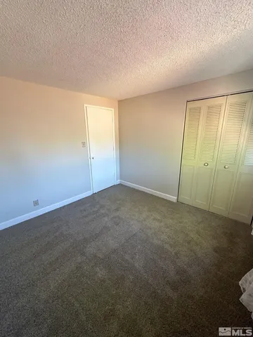 an empty room with an entryway