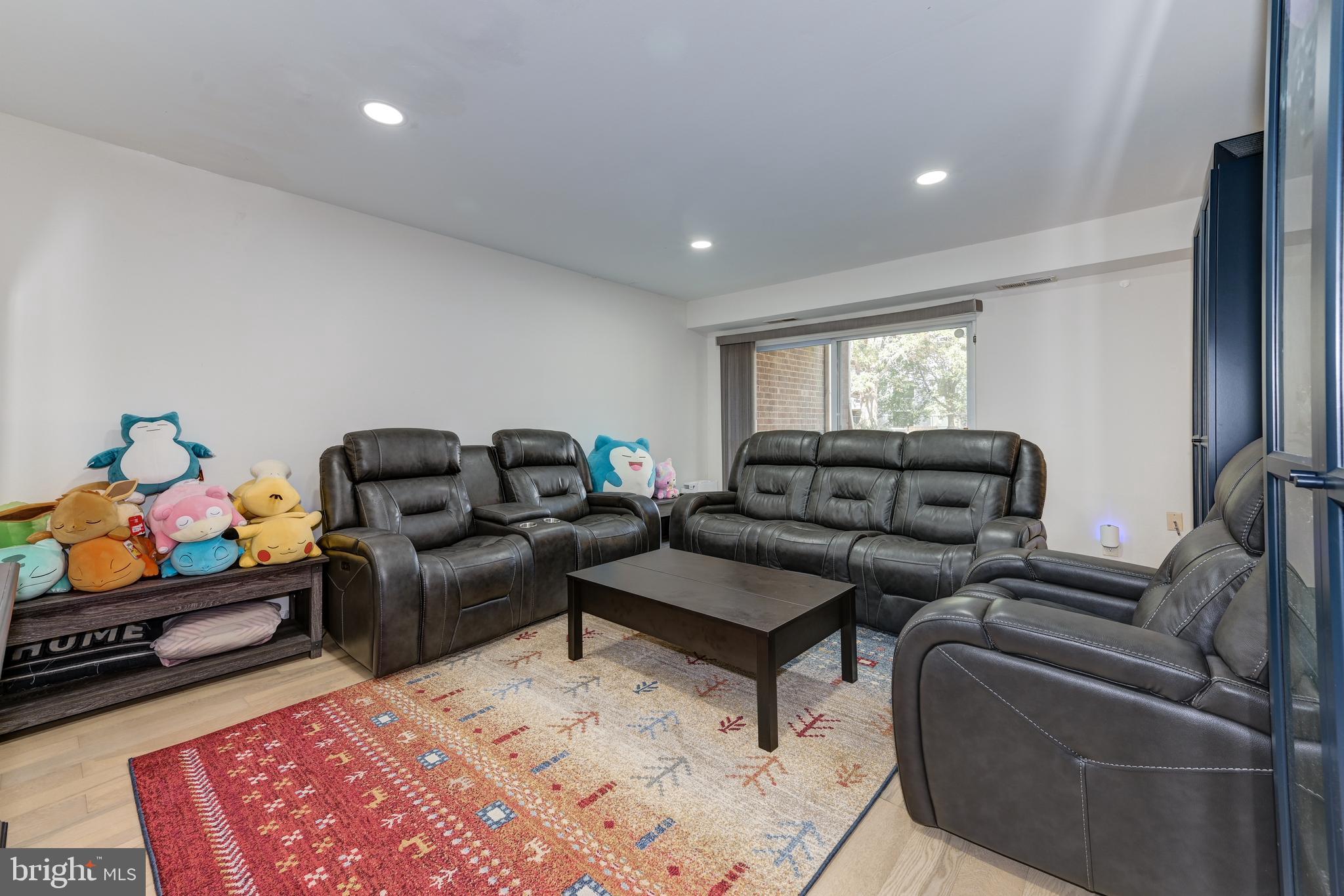 126 Kirkbride Road Voorhees, NJ 08043 - Photo 9 of 25 a living room with furniture and a couch