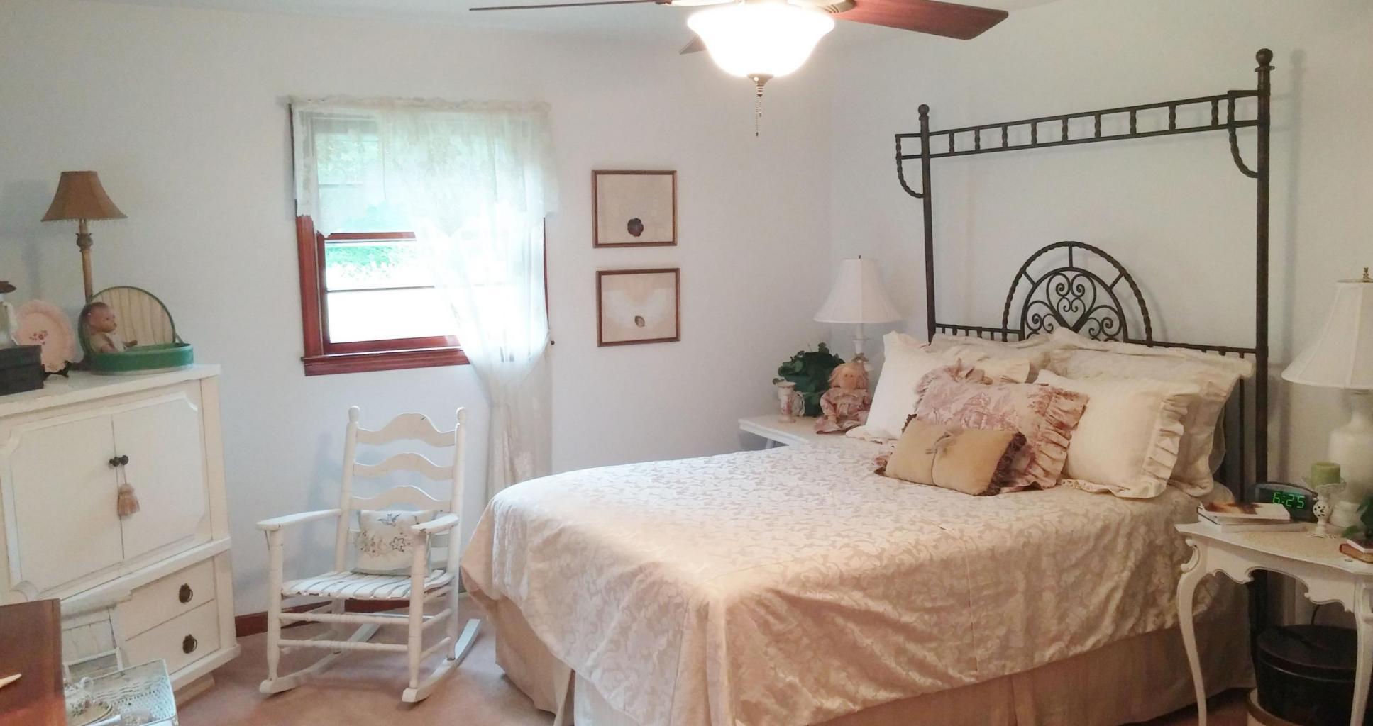 10454 Henry Road Henry, VA 24102 - Photo 13 of 72 a bedroom with a bed and a dresser