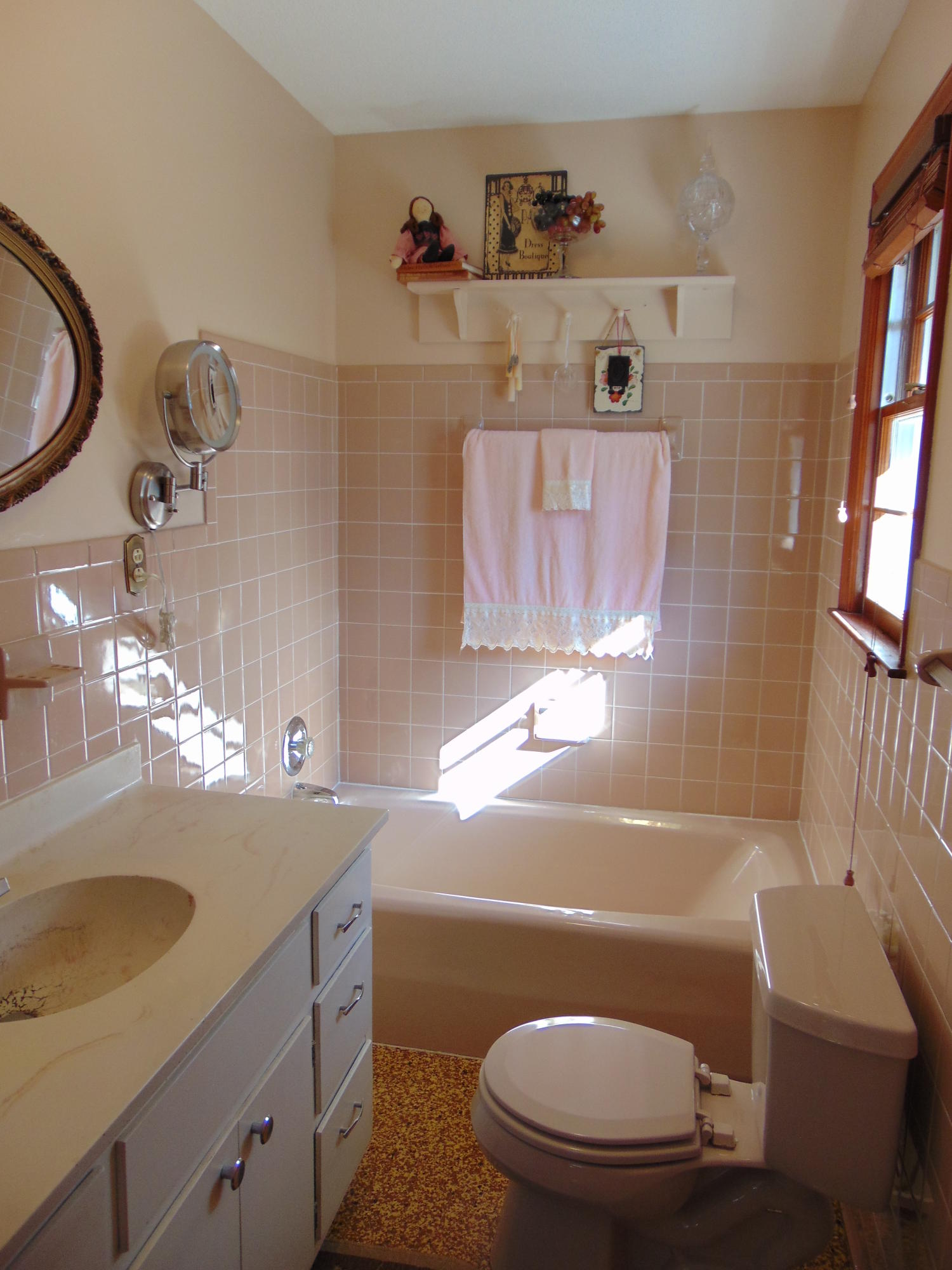 10454 Henry Road Henry, VA 24102 - Photo 15 of 72 a bathroom with a granite countertop toilet sink and mirror