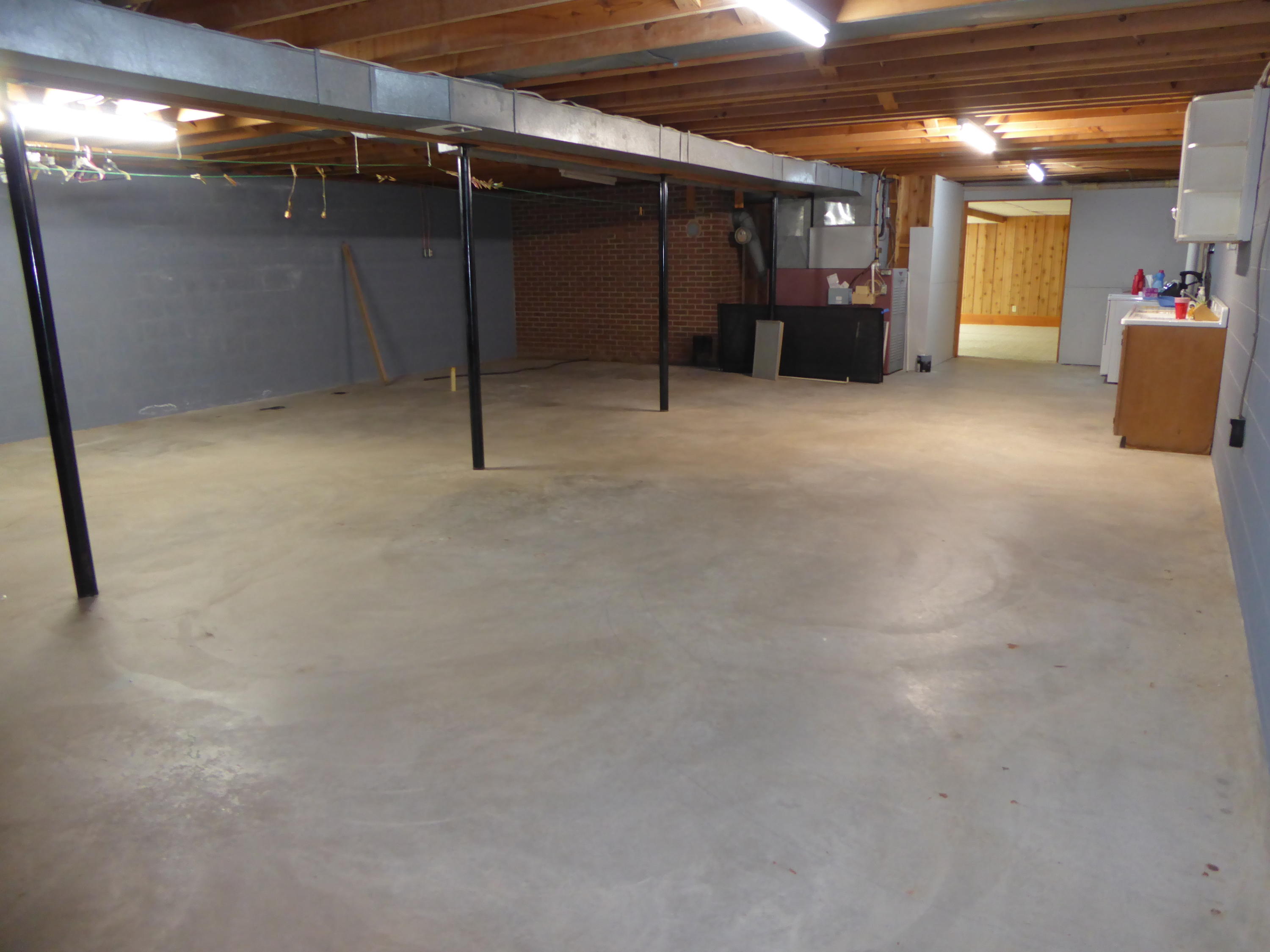 10454 Henry Road Henry, VA 24102 - Photo 30 of 72 a view of a empty room with wooden ceiling