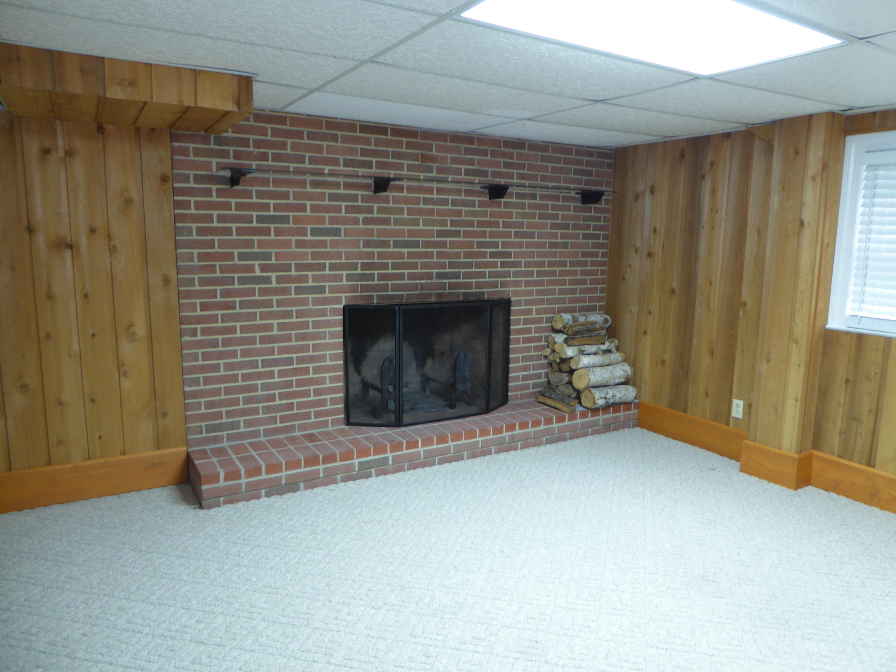 10454 Henry Road Henry, VA 24102 - Photo 65 of 72 a view of an empty room with a fireplace