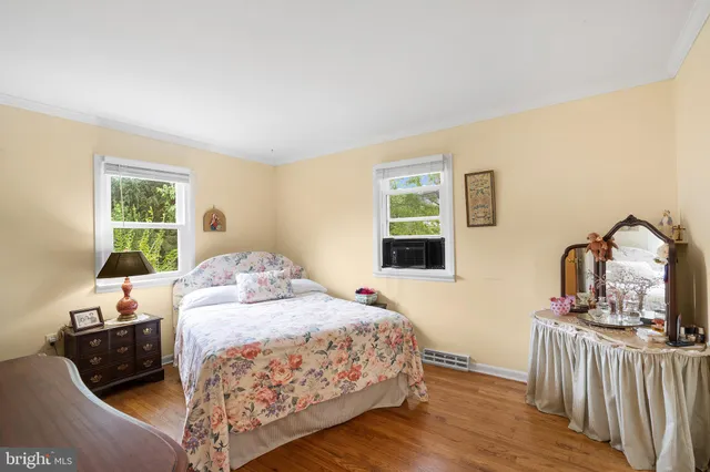 a bathroom with a toilet sink and vanity