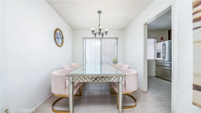 a bathroom with a toilet a sink and a mirror