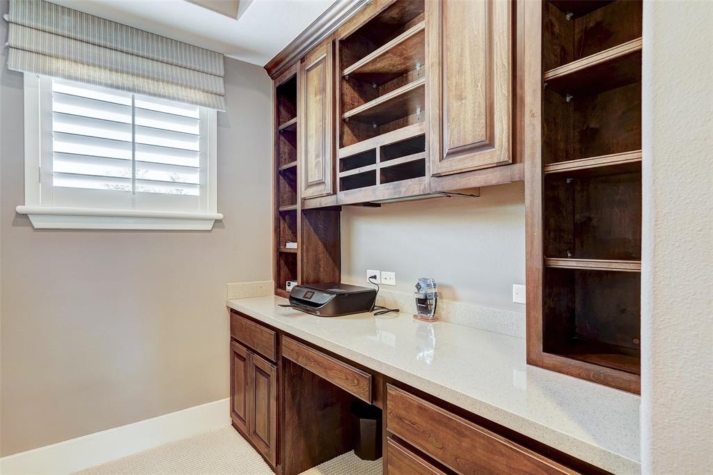 4501 Westlake Drive, Unit 23 Austin, TX 78746 - Photo 11 of 15 a kitchen with stainless steel appliances a sink and cabinets
