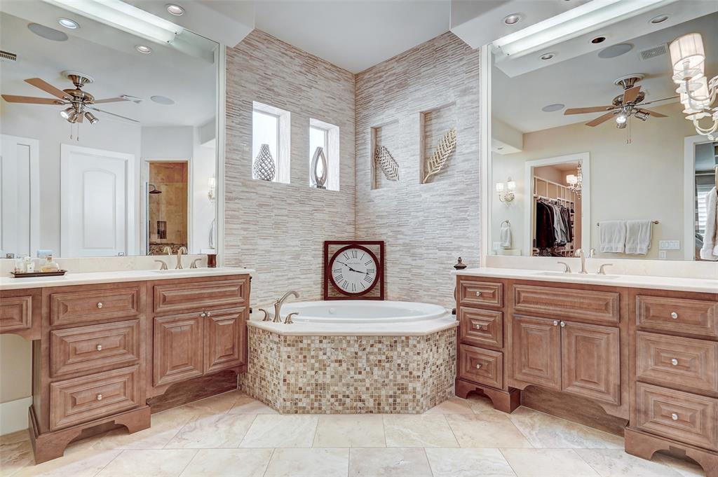 4501 Westlake Drive, Unit 23 Austin, TX 78746 - Photo 8 of 15 a bathroom with a granite countertop sink and a mirror