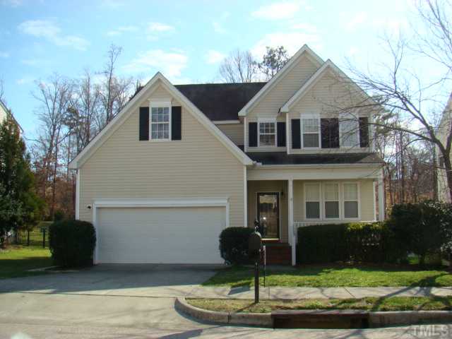 2512 Spruce Shadows Lane Raleigh, NC 27614 - Photo 1 of 22 a front view of a house with a yard