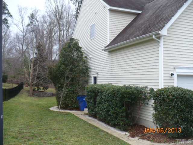 2512 Spruce Shadows Lane Raleigh, NC 27614 - Photo 20 of 22 a view of a backyard of the house