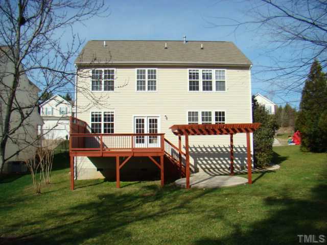 2512 Spruce Shadows Lane Raleigh, NC 27614 - Photo 2 of 22 a front view of a house with a yard