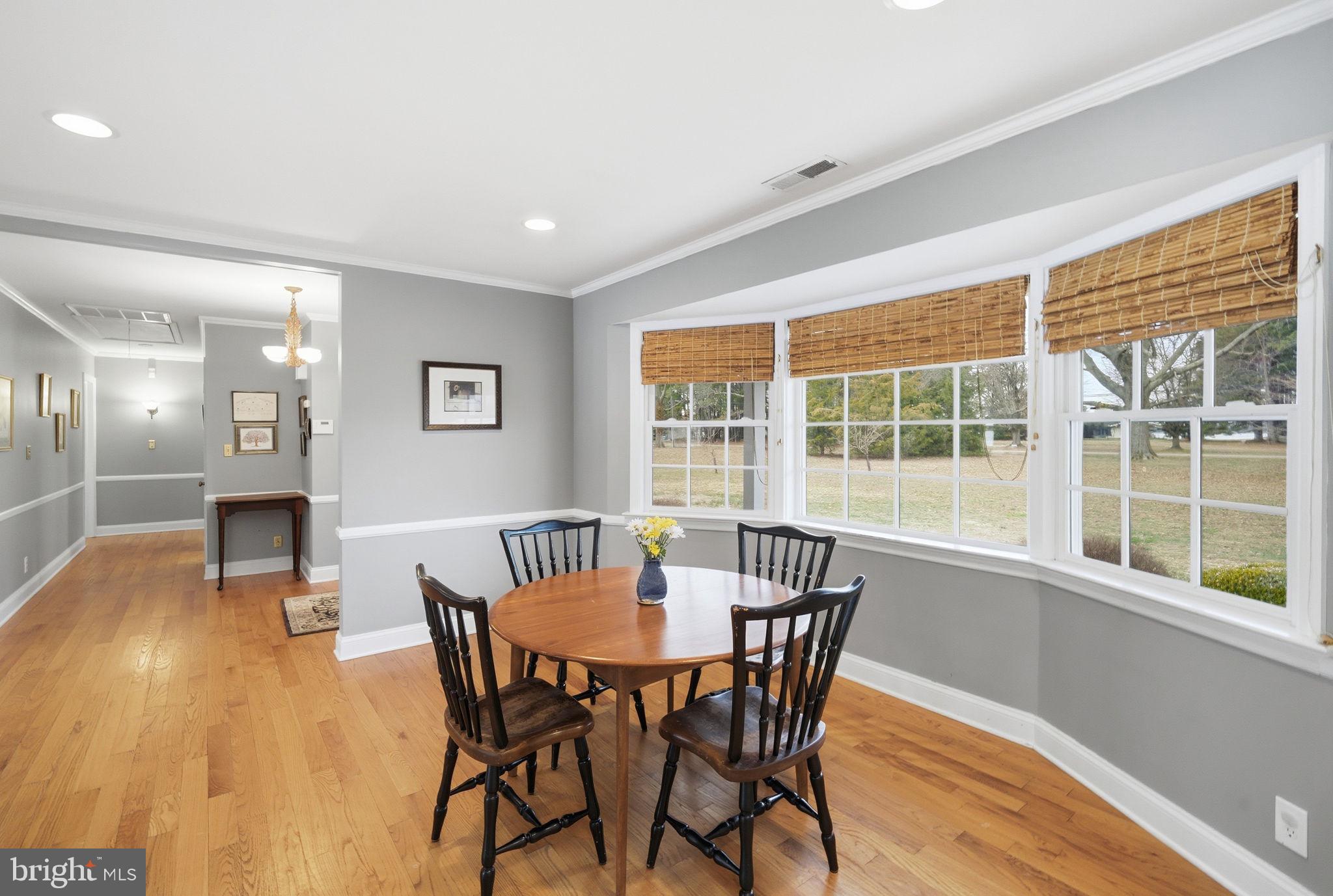 7149 Drum Point Road St. Michaels, MD 21663 - Photo 21 of 71 BREAKFAST TABLE HAS DISTANT VIEW OF OTHER WATER