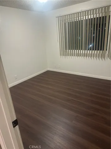 a view of wooden floor and a sink