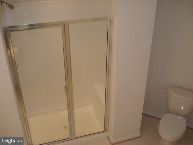7305 Maplecrest Road, Unit 403 Elkridge, MD 21075 - Photo 3 of 30 a bathroom with a shower