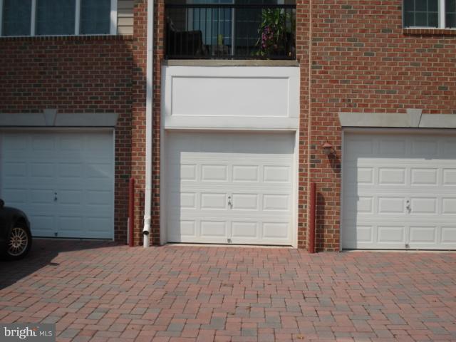 7305 Maplecrest Road, Unit 403 Elkridge, MD 21075 - Photo 9 of 30 a view of a house with a door and a window