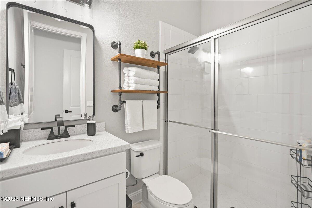 470 Parkbluff Circle Ponte Vedra, FL 32081 - Photo 20 of 42 a bathroom with a sink toilet and shower
