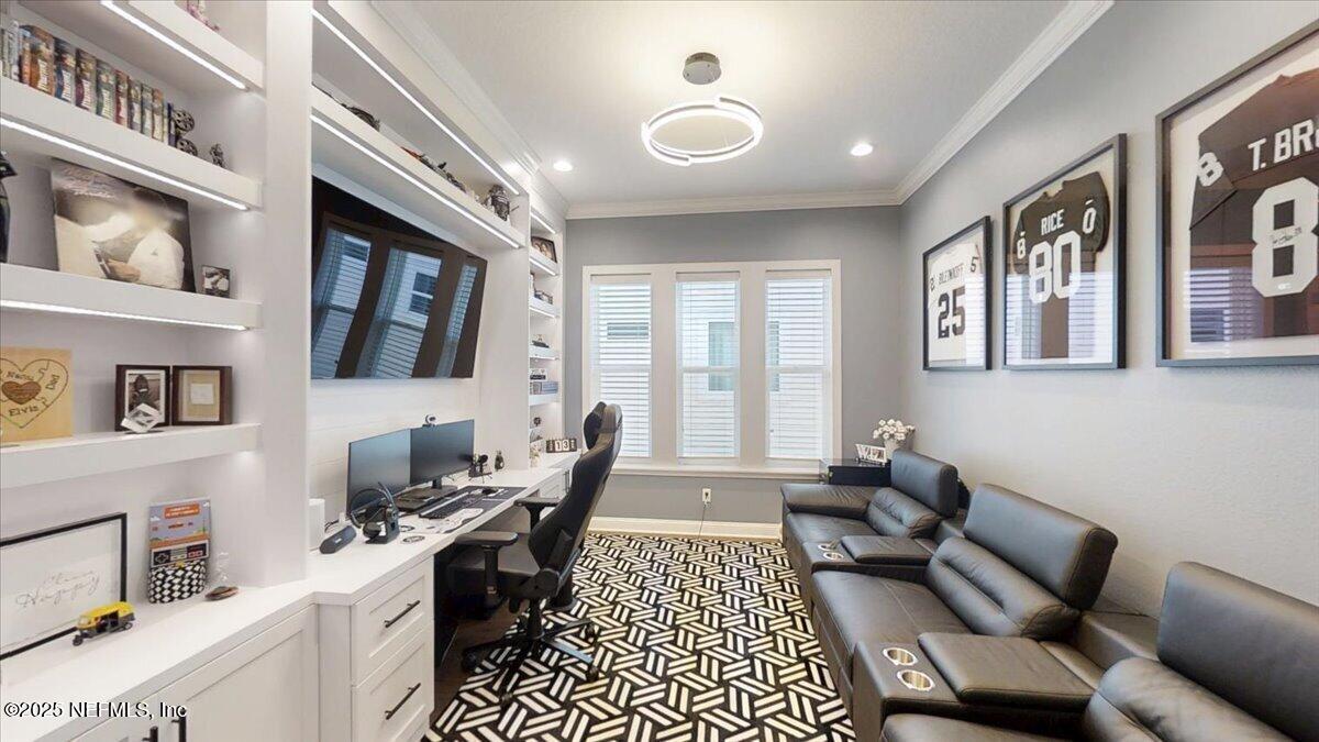 470 Parkbluff Circle Ponte Vedra, FL 32081 - Photo 21 of 42 a living room with furniture and a flat screen tv