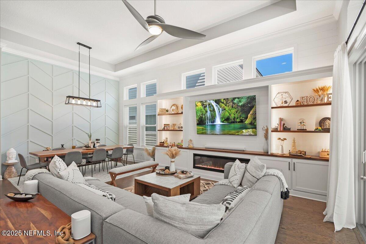 470 Parkbluff Circle Ponte Vedra, FL 32081 - Photo 29 of 42 a living room with furniture fireplace and a window