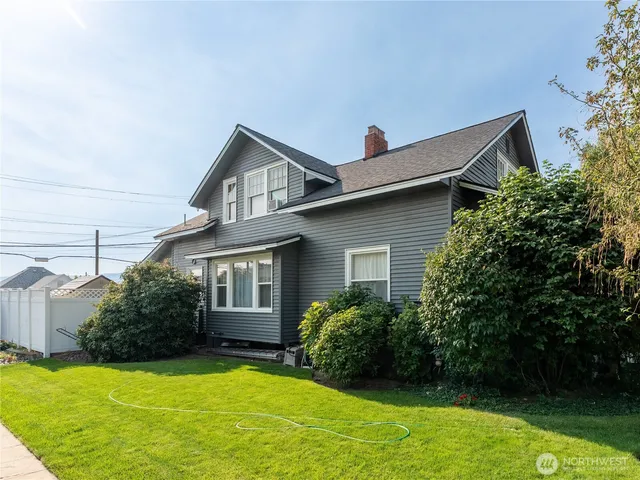 a house view with a garden space
