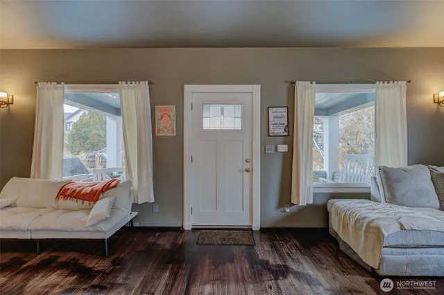 a view of a livingroom with furniture and window