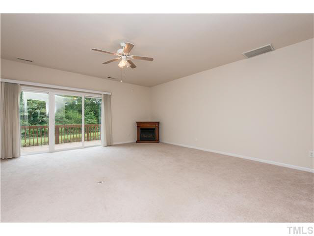 5605 Amanda Lynn Lane Raleigh, NC 27613 - Photo 8 of 25 a view of an empty room with a window