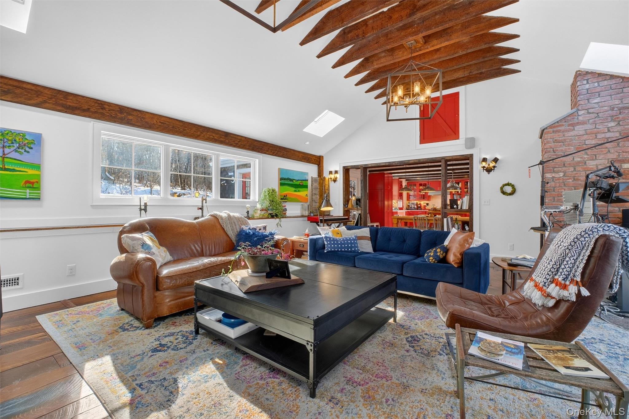 1125 Old Quaker Hill Road Pawling, NY 12564 - Photo 8 of 38 a living room with furniture a rug and a window