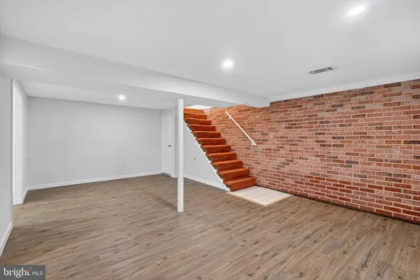 a hallway with a wooden floor