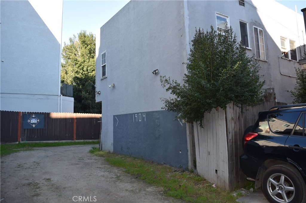 1900 East 6th Street Long Beach, CA 90802 - Photo 22 of 22 a front view of a house with a yard and garage