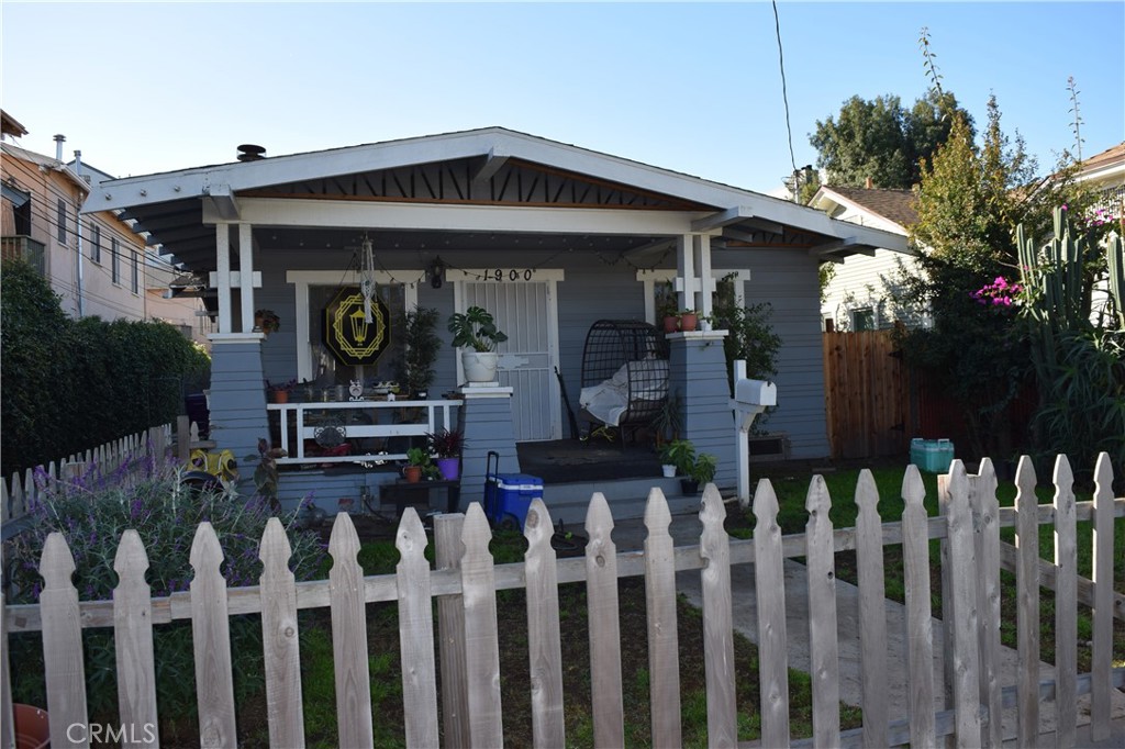 1900 East 6th Street Long Beach, CA 90802 - Photo 4 of 22 a front view of house with deck and garden