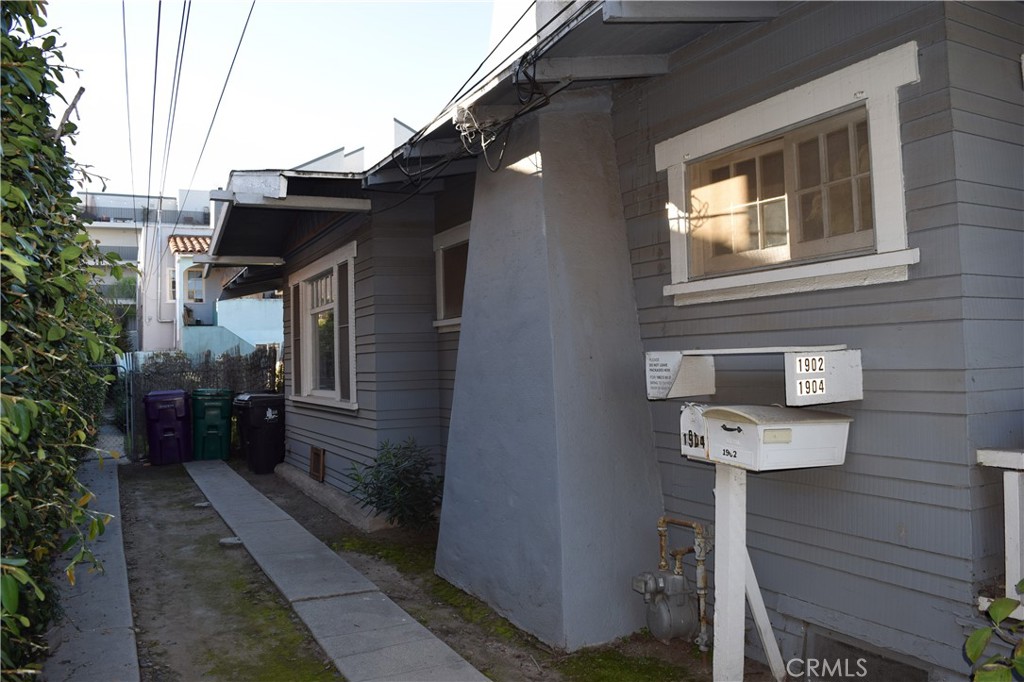1900 East 6th Street Long Beach, CA 90802 - Photo 5 of 22 a front view of a house with many windows