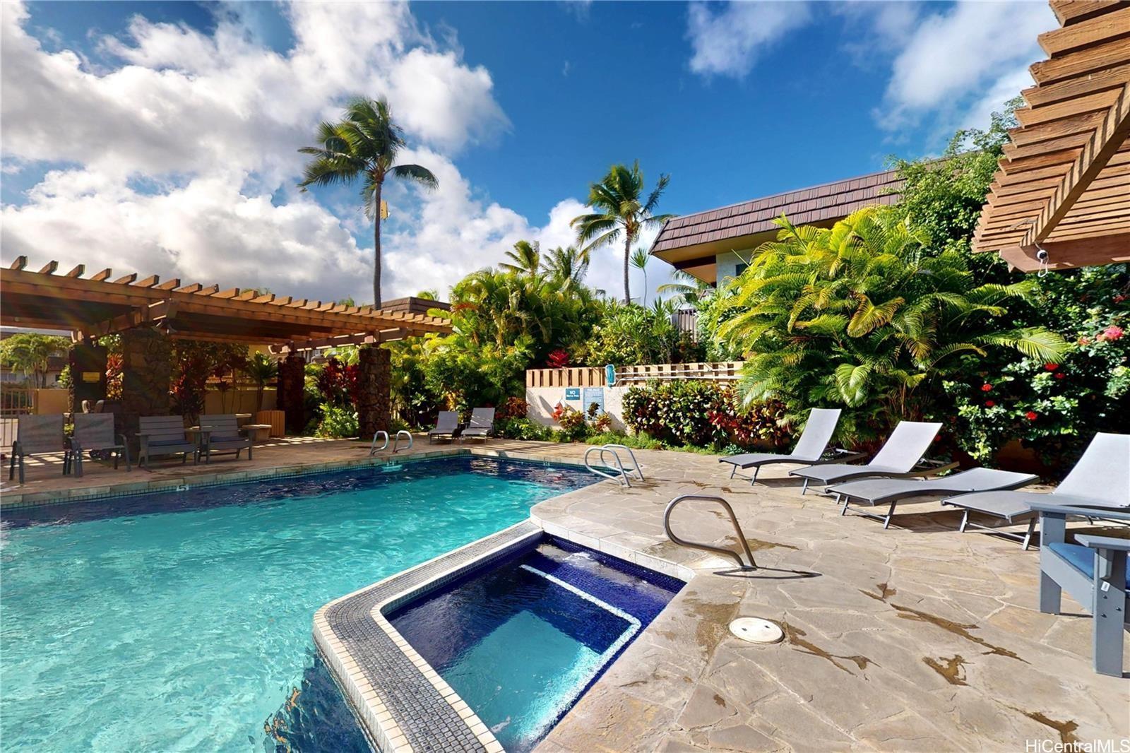 444 Lunalilo Home Road, Unit 327 Honolulu, HI 96825 - Photo 15 of 15 a view of a backyard with plants and a patio