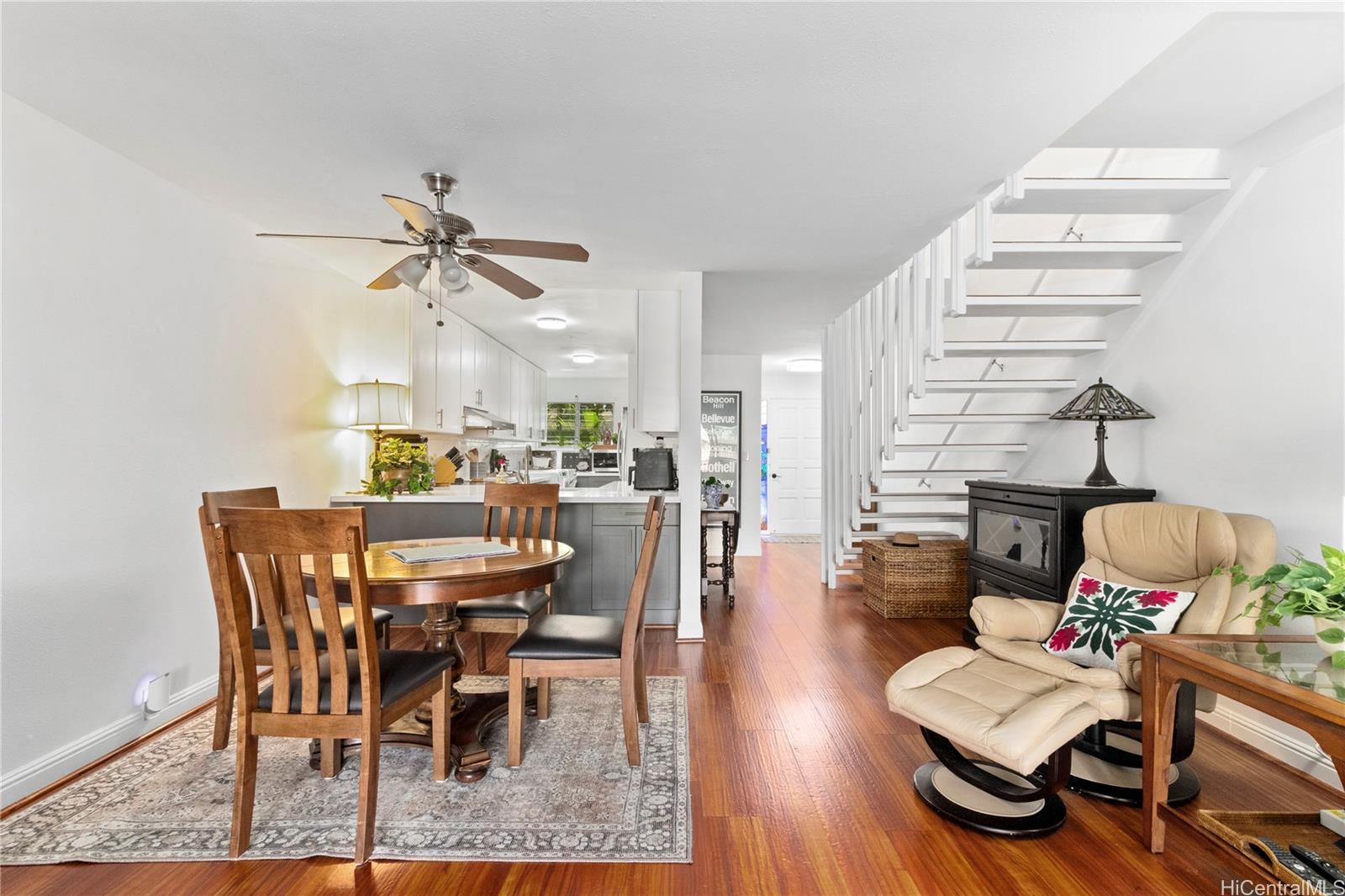 444 Lunalilo Home Road, Unit 327 Honolulu, HI 96825 - Photo 3 of 15 a view of a dining room with furniture and wooden floor