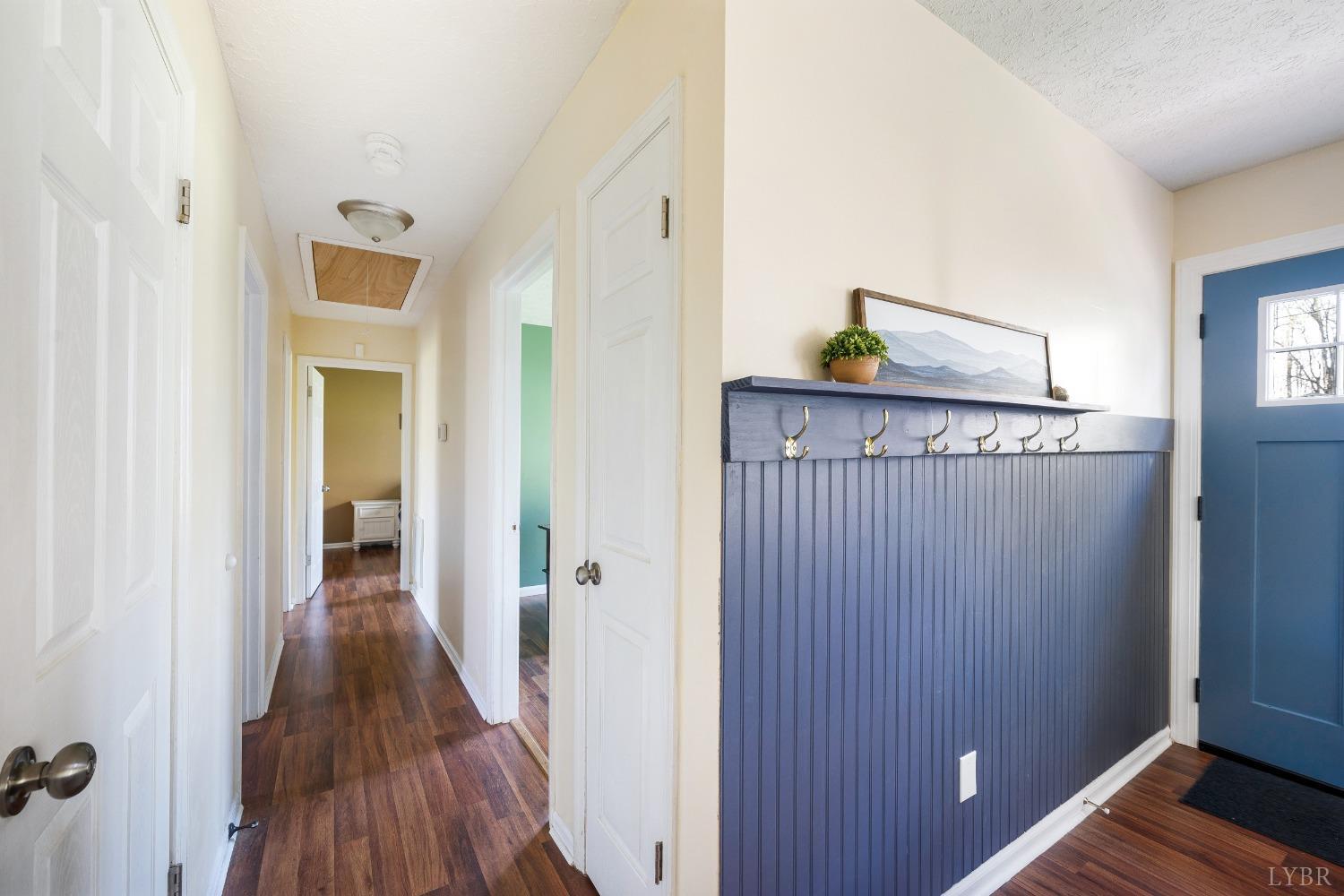 503 Sweeney Circle Forest, VA 24551 - Photo 11 of 50 a view of a hallway with wooden floor and closet