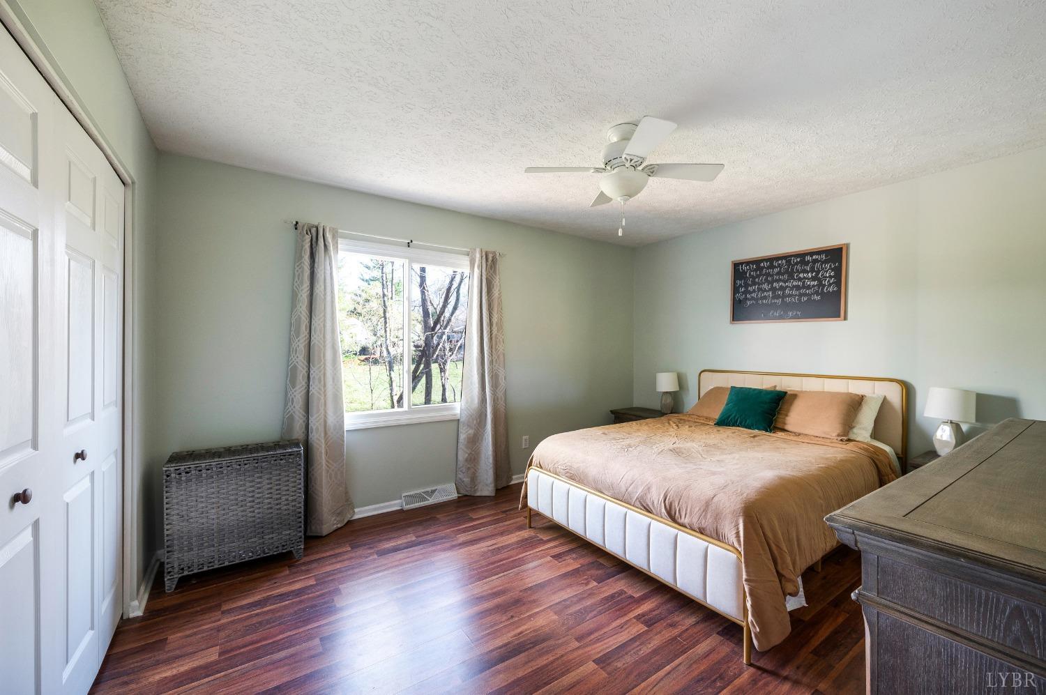 503 Sweeney Circle Forest, VA 24551 - Photo 14 of 50 a bedroom with a bed and a window